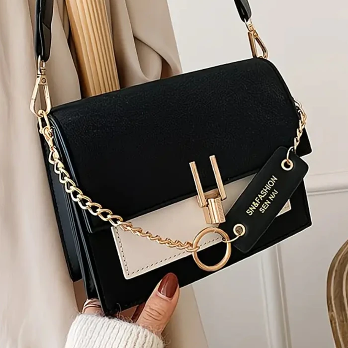Cartera bicolor detalle dorado  1