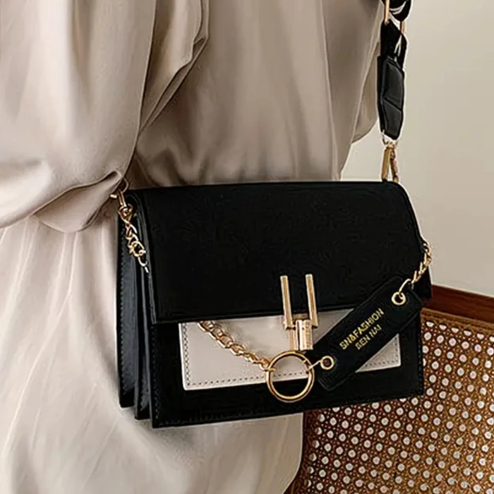 Cartera bicolor detalle dorado  3