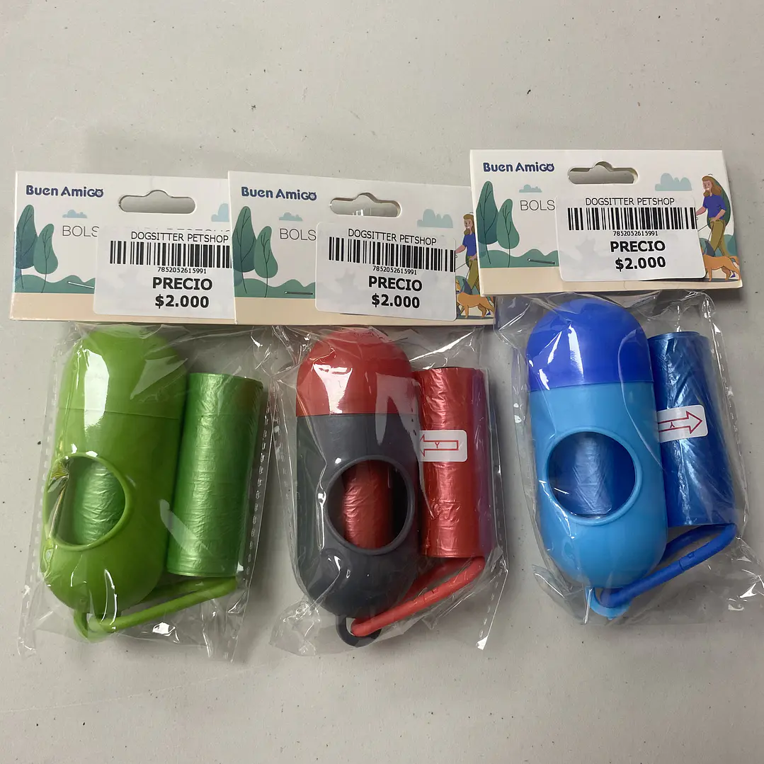 DISPENSADOR DE BOLSAS DE DESECHOS + 2 ROLLOS DE BOLSAS . 1