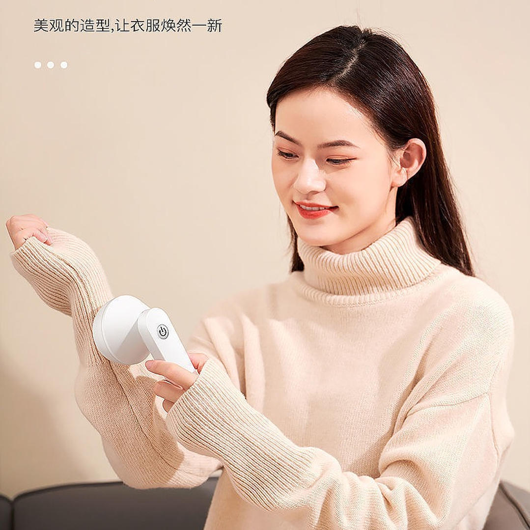 SACA PELUSA PORTÁTIL RECARGABLE  1