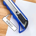 CORTA CARTON CALIDAD COLORES 18CM