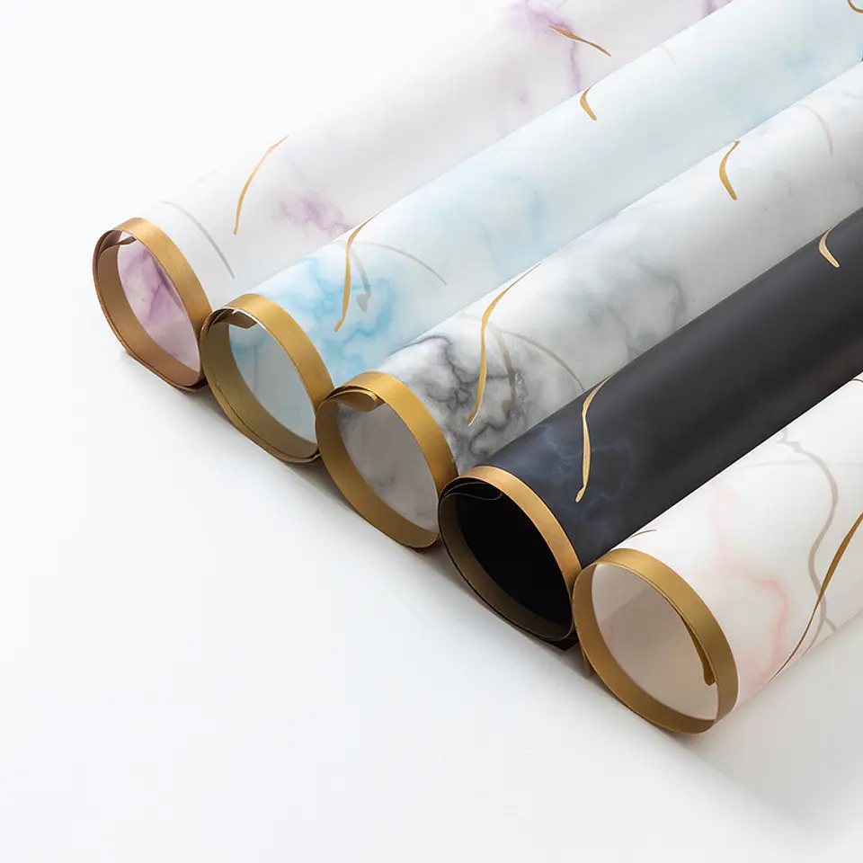 PAPEL COREANO CON DISEÑO MARMOL Y BORDE DORADO 9
