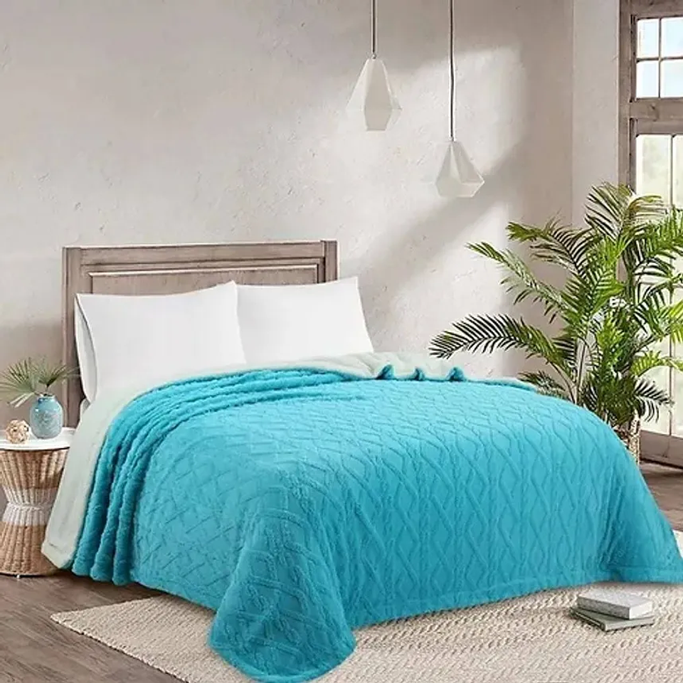 FRAZADA TEXTURIZADA CON CHIPORRO DE 2.0 PLAZAS 220x230CM 10