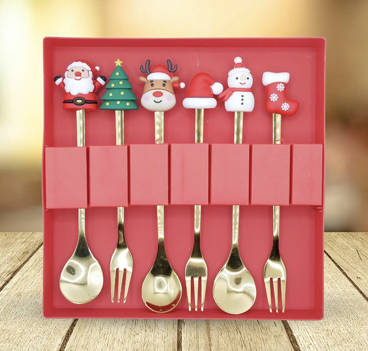 SET DE 6 CUBIERTOS DE ACERO DORADO NAVIDAD CON GOMA- POR MAYOR 10