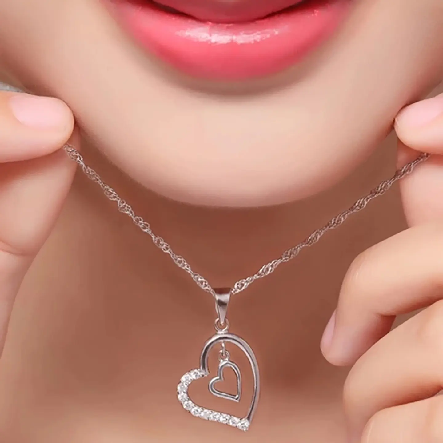 Collar Doble Corazon Interior Plateado 3