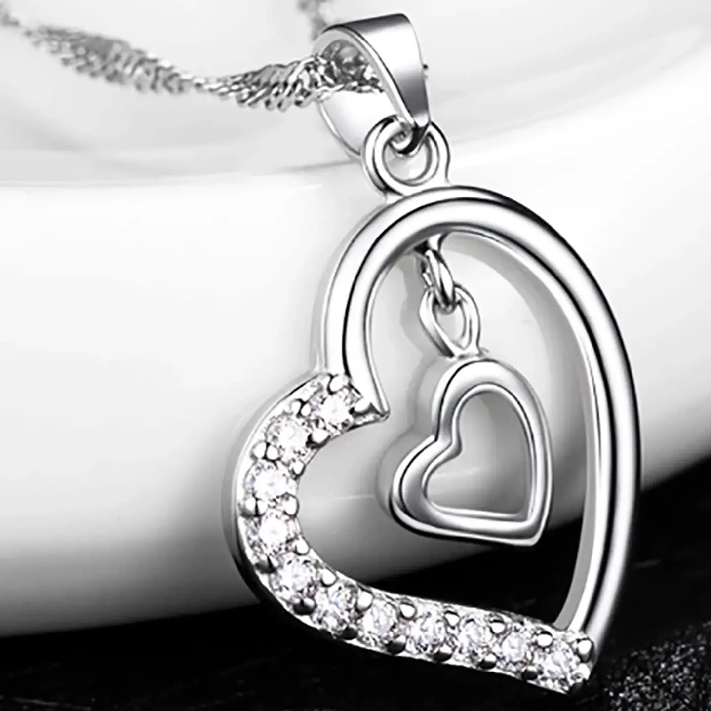 Collar Doble Corazon Interior Plateado 4