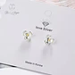 Aros de Flor Tres Petalos Plateados - Miniatura 4