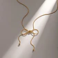 Collar Lazo Coquette Nudo - Acero Inoxidable Bañado Oro 18k - Miniatura 5