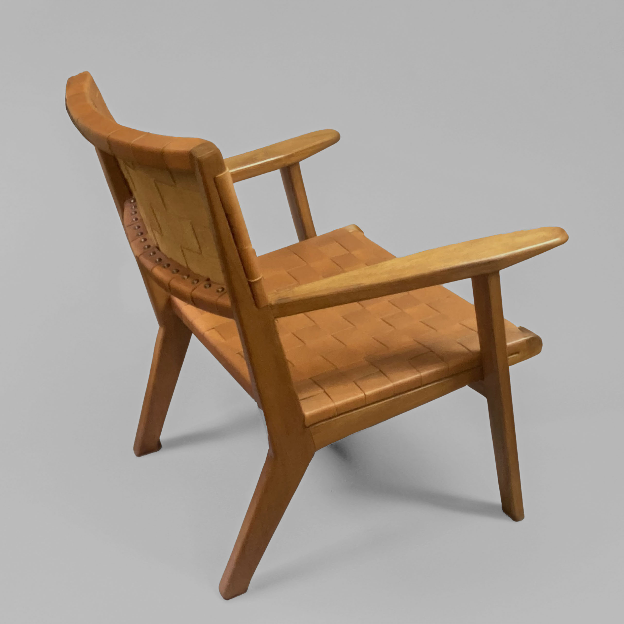 POLTRONA TEJIDA EN CUERO