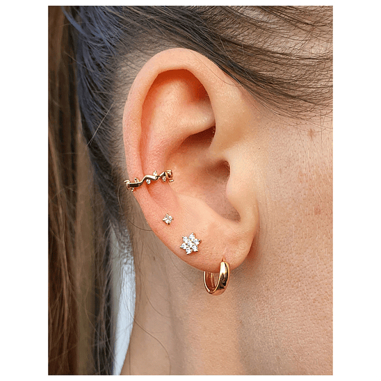 Piercing flor dorada 2