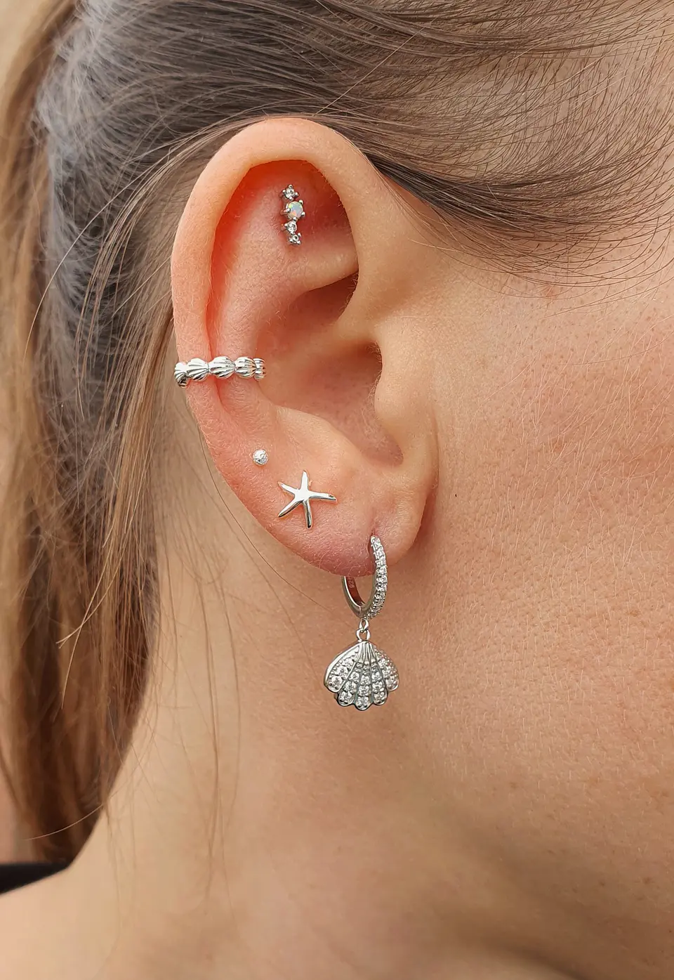 Piercing con ópalo 2