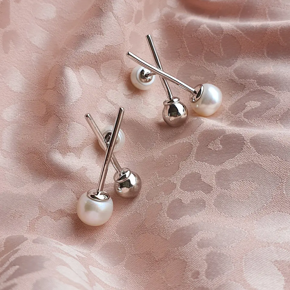 Aros cruzados con perlas 3