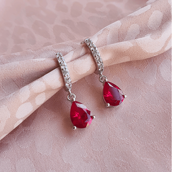 Argollas con circón rubí 3