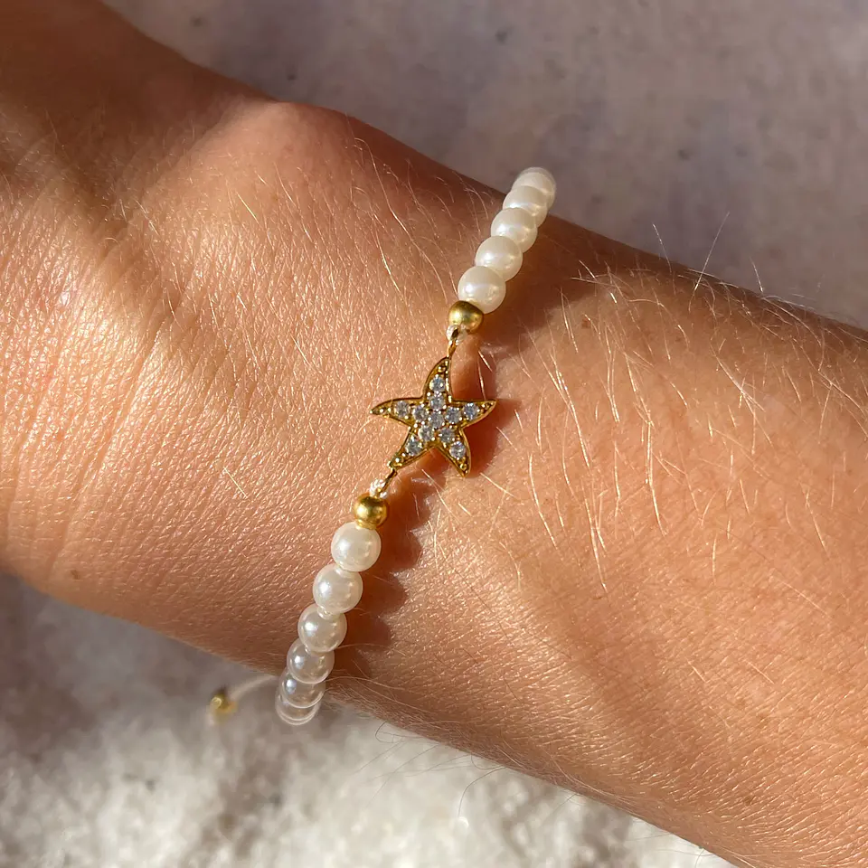 Pulsera de cordón con perlas y estrella de mar 1