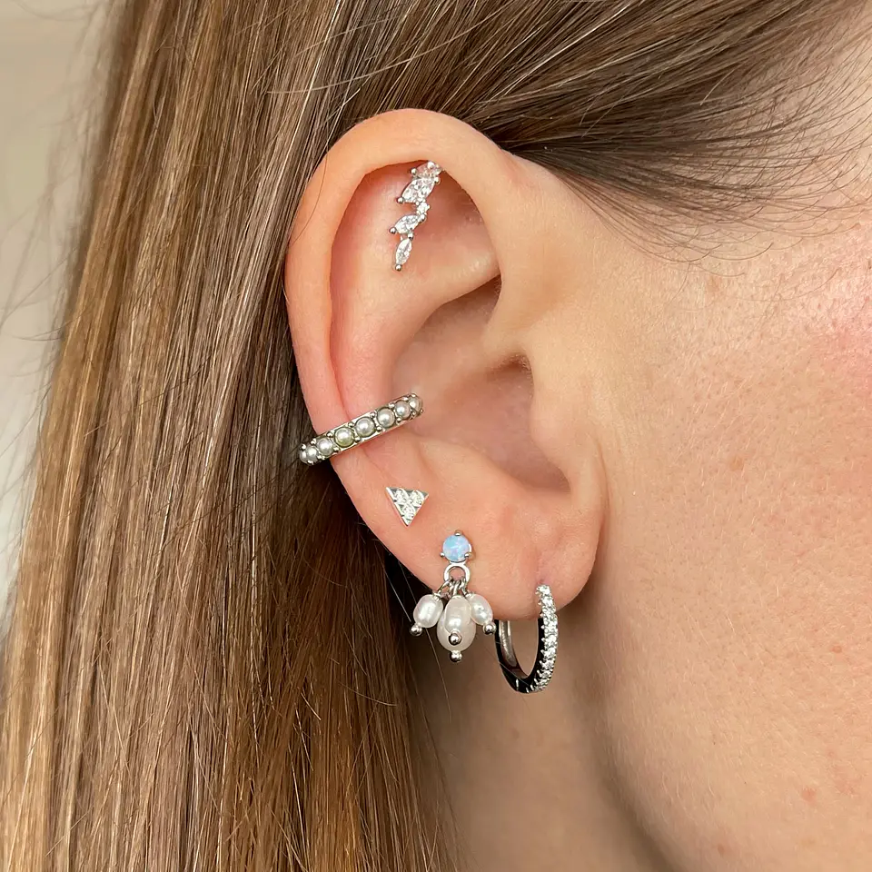 Piercing oreja izquierda 5