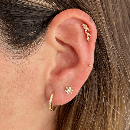 Piercing oreja izquierda 3