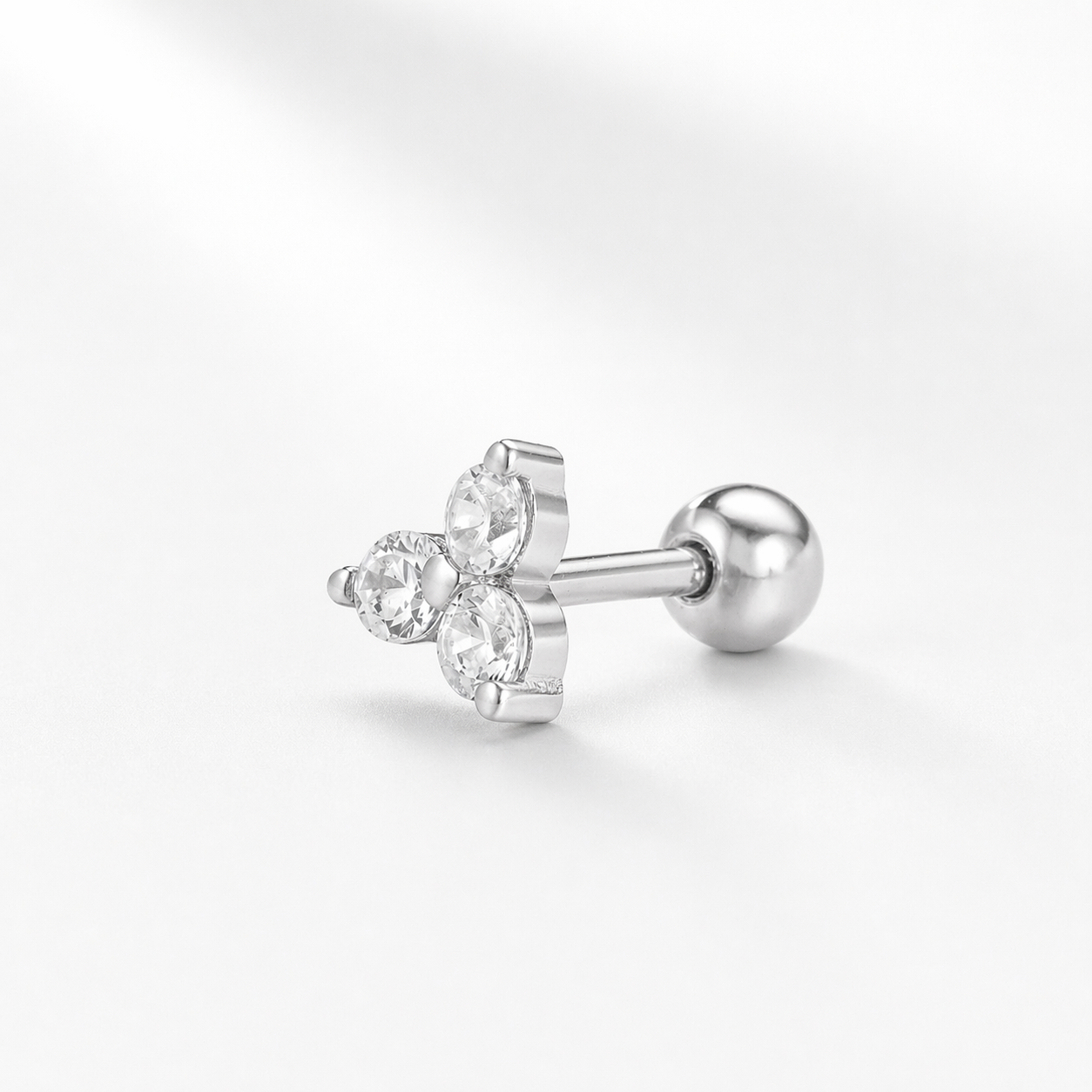 Piercing triángulo