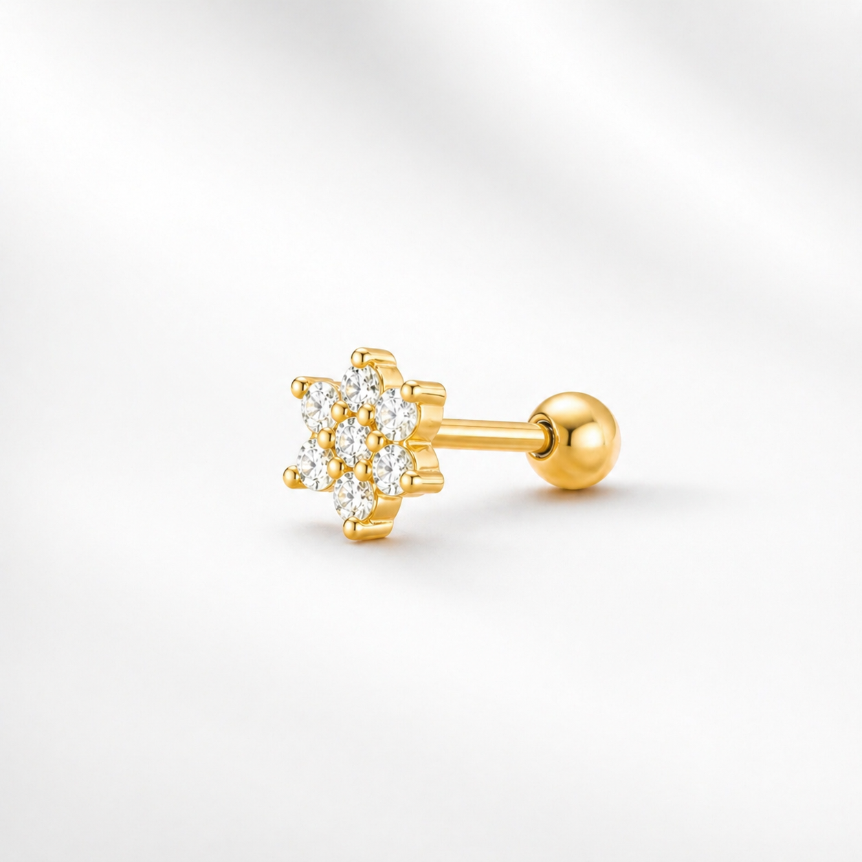 Piercing flor dorada 5,5 mm