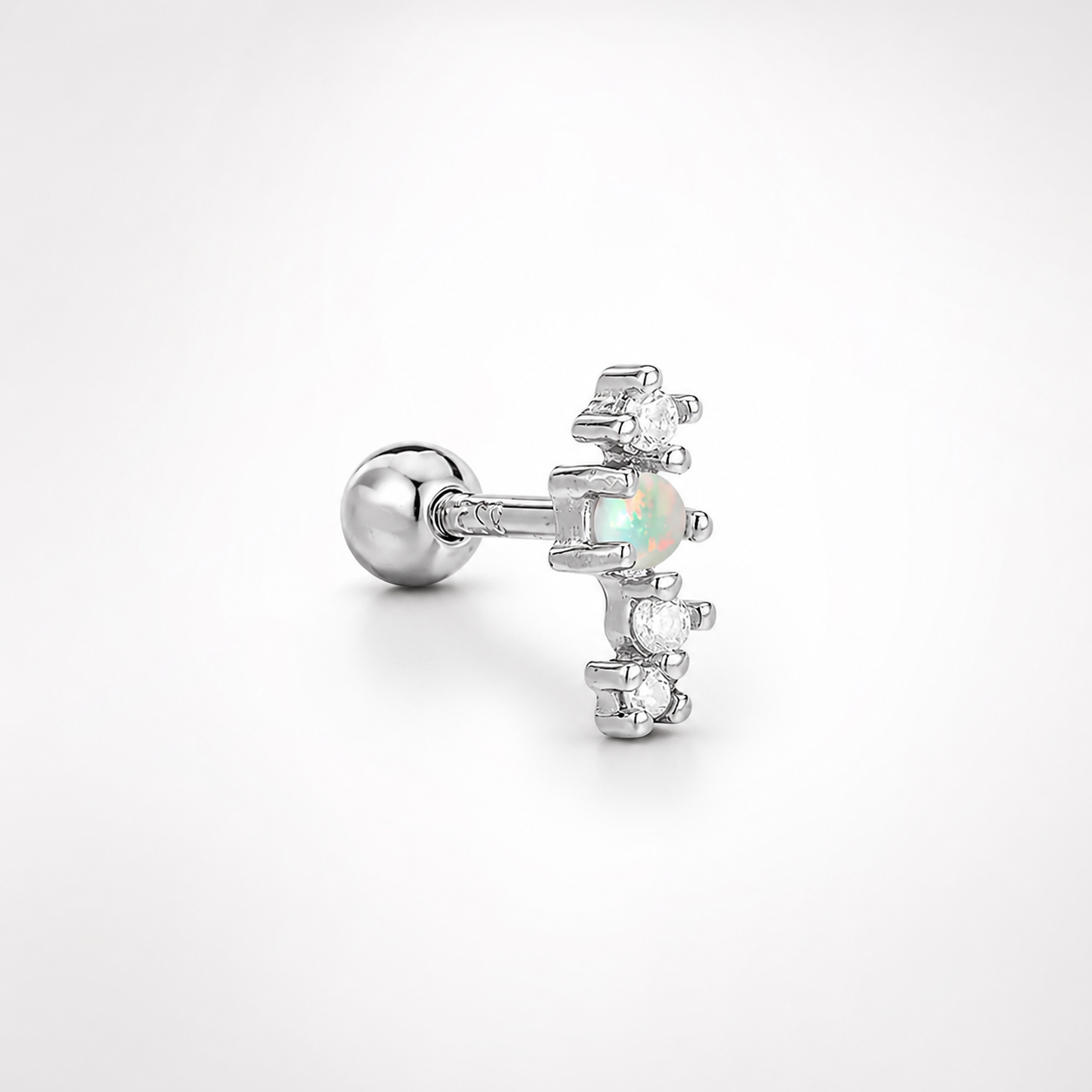 Piercing con ópalo