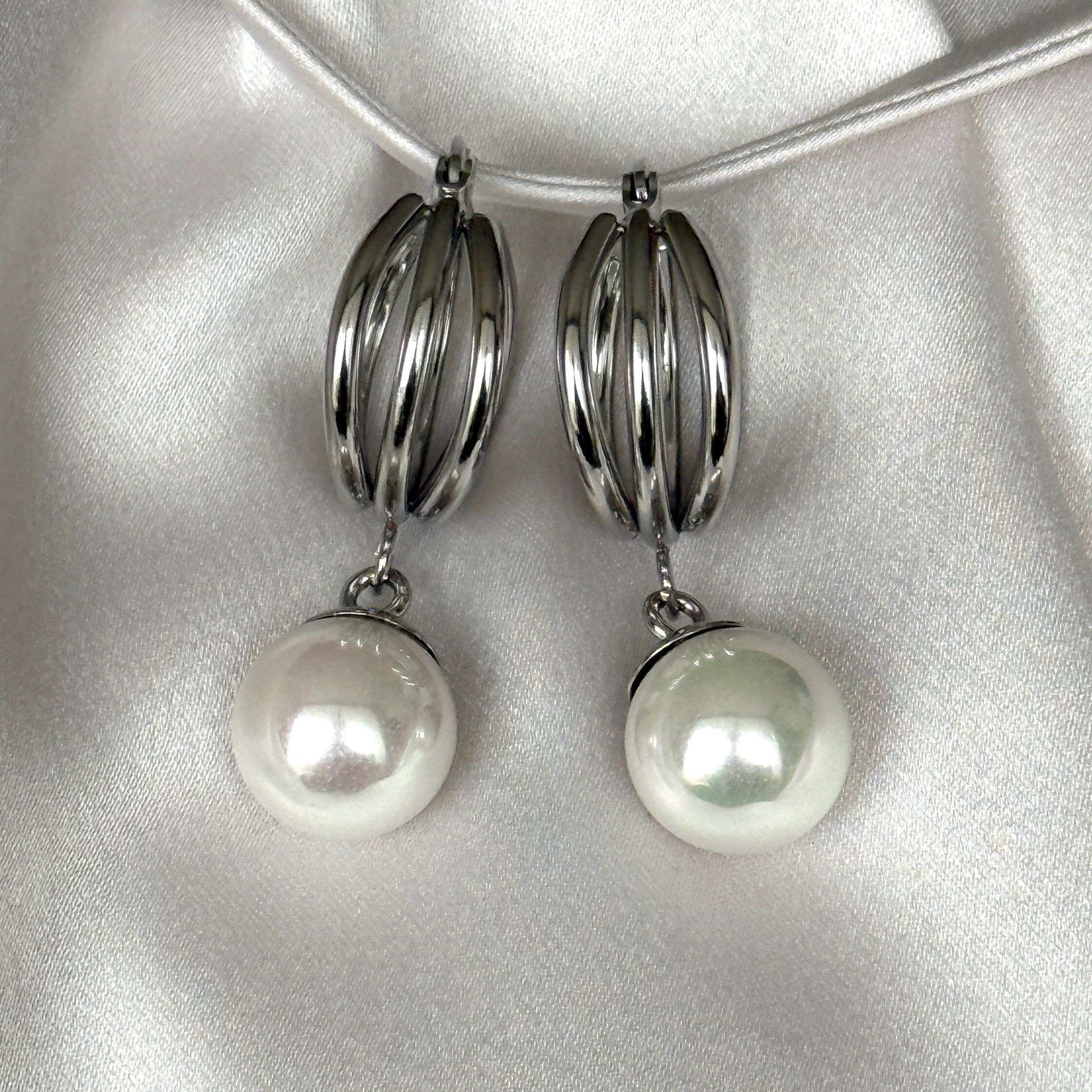 Argollas triples con perla a.q.