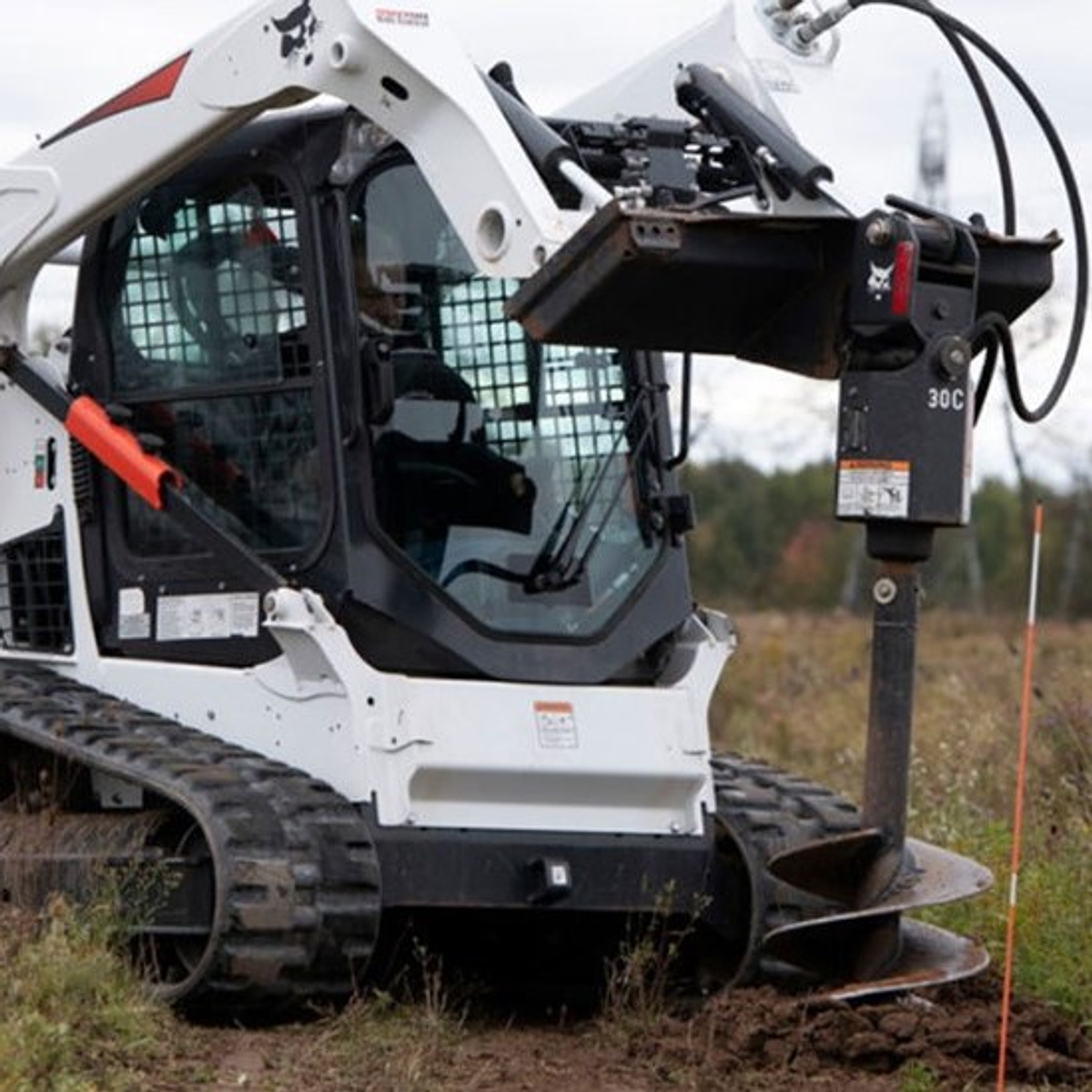 Minicargador con Barreno 1