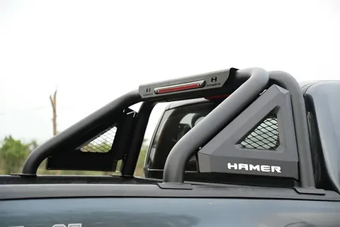 BARRA 4X4 HEAVY DUTY HAMER SERIE KNIGHT EN TUBO DE ACERO 76.2 MM CON TERCERA LUZ DE FRENO LED PARA TOYOTA HILUX REVO 2016 EN ADELANTE