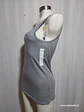 POLERA S/M GRIS NEW DAY TALLA XXL - Miniatura 3