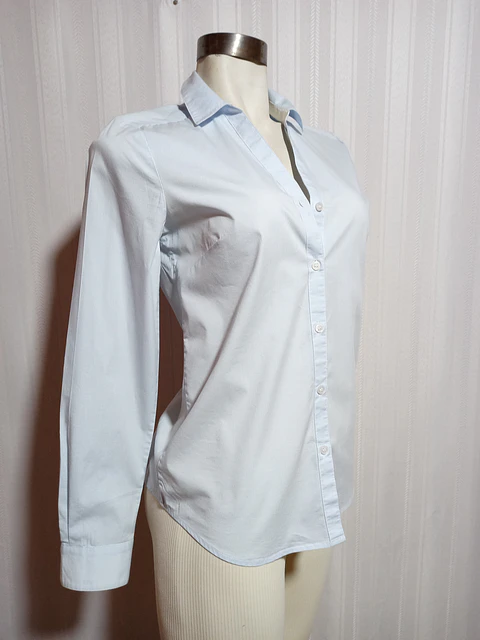 BLUSA CELESTE H&M TALLA 36