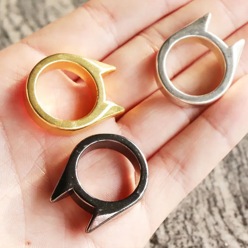 ANILLO DEFENSA PERSONAL TIPO MANOPLA DESTAPADOR METAL GATO 10