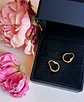 Argollas Huggies Pequeñas Relieve Oro 18k - Miniatura 6