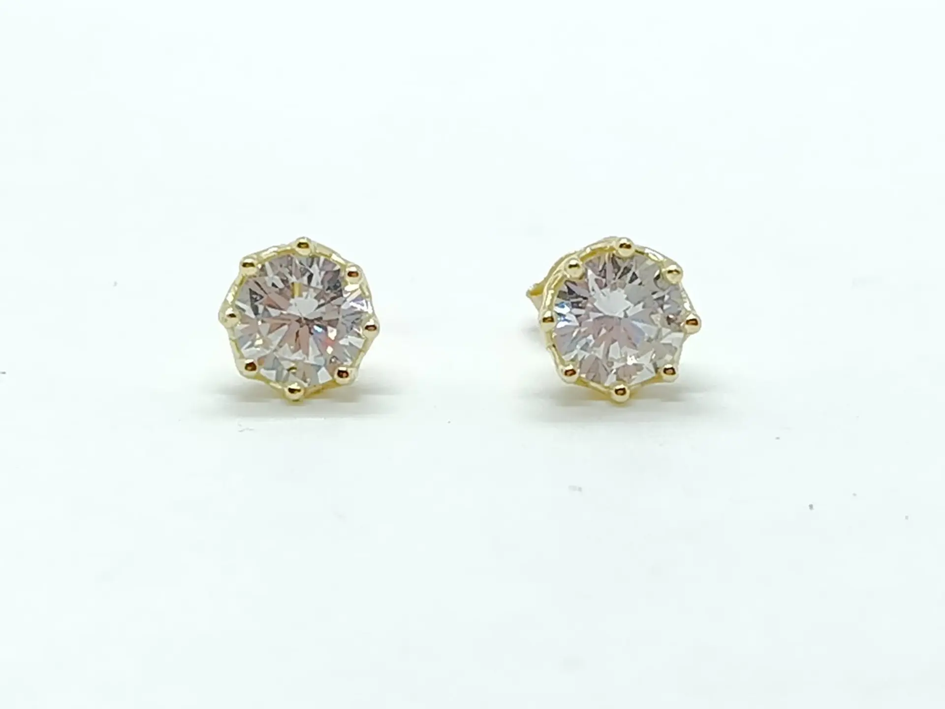 Aros Puntos de Luz Plata fina ley S925 baño de oro 18k 10