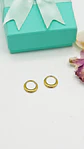 Argollas chicas clicker 16G chunky titanio astm f136 chapadas en oro  - Miniatura 4