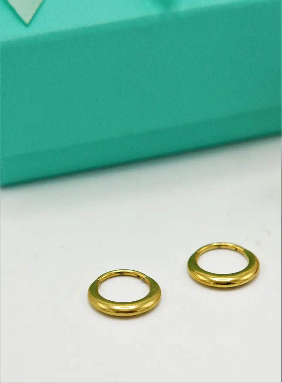 Argollas chicas clicker 16G chunky titanio astm f136 chapadas en oro  8