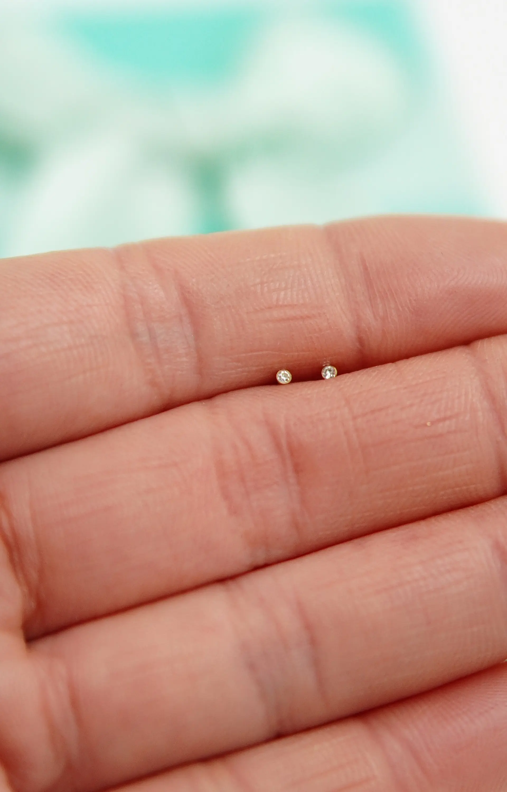 Aros punto de luz chicos 1.5mm titanio 20g 6