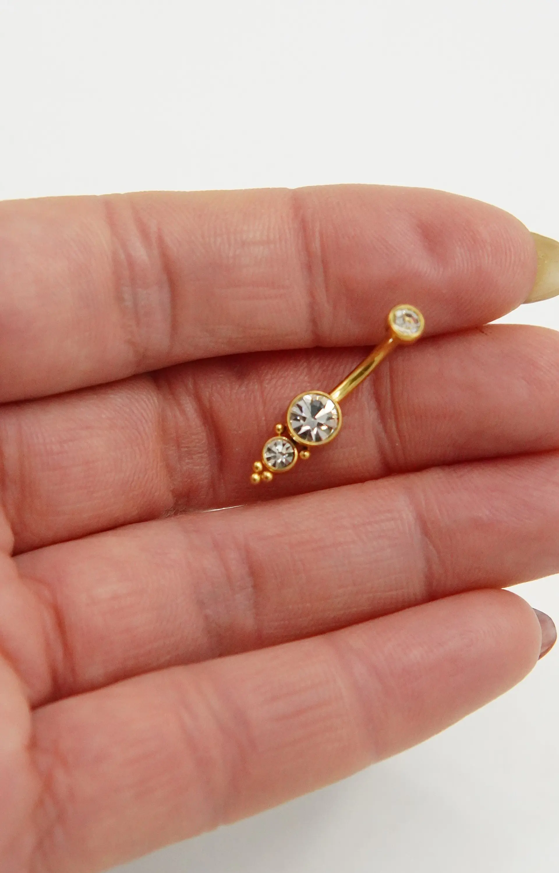 Piercing ombligo navel 10 mm 14G titanio ASTM F136 espiga dorada 6