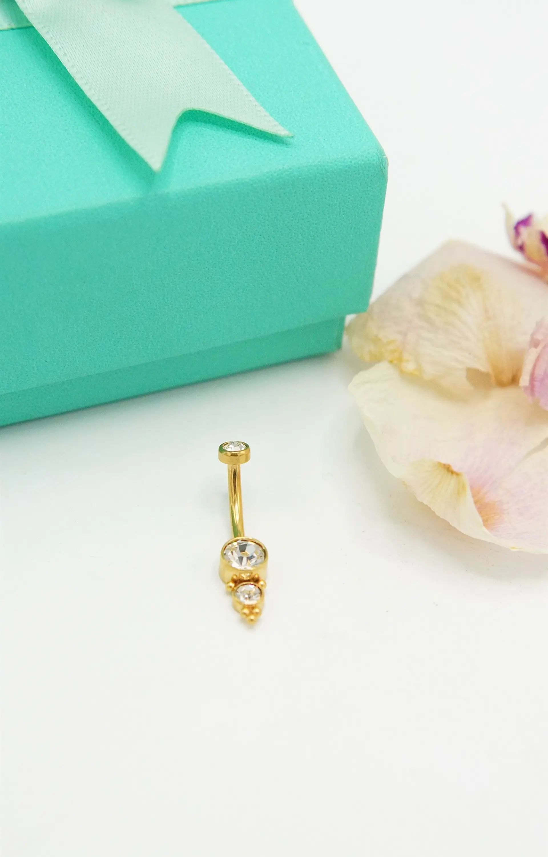 Piercing ombligo navel 10 mm 14G titanio ASTM F136 espiga dorada 7