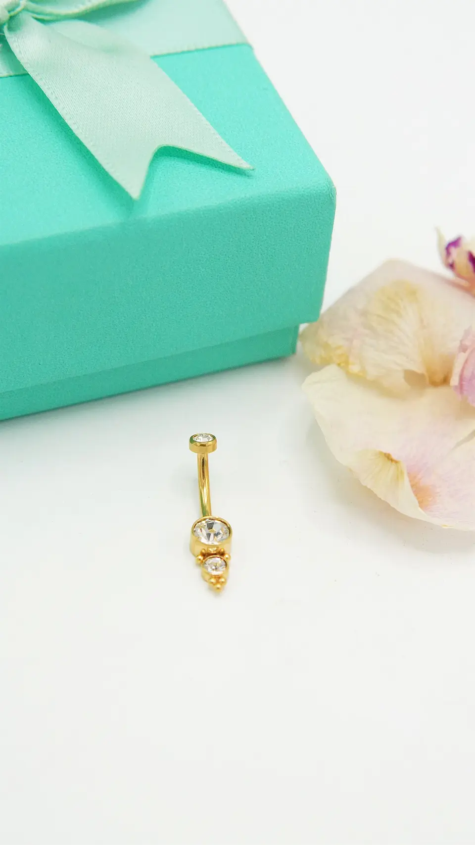Piercing ombligo navel 10 mm 14G titanio ASTM F136 espiga dorada 7