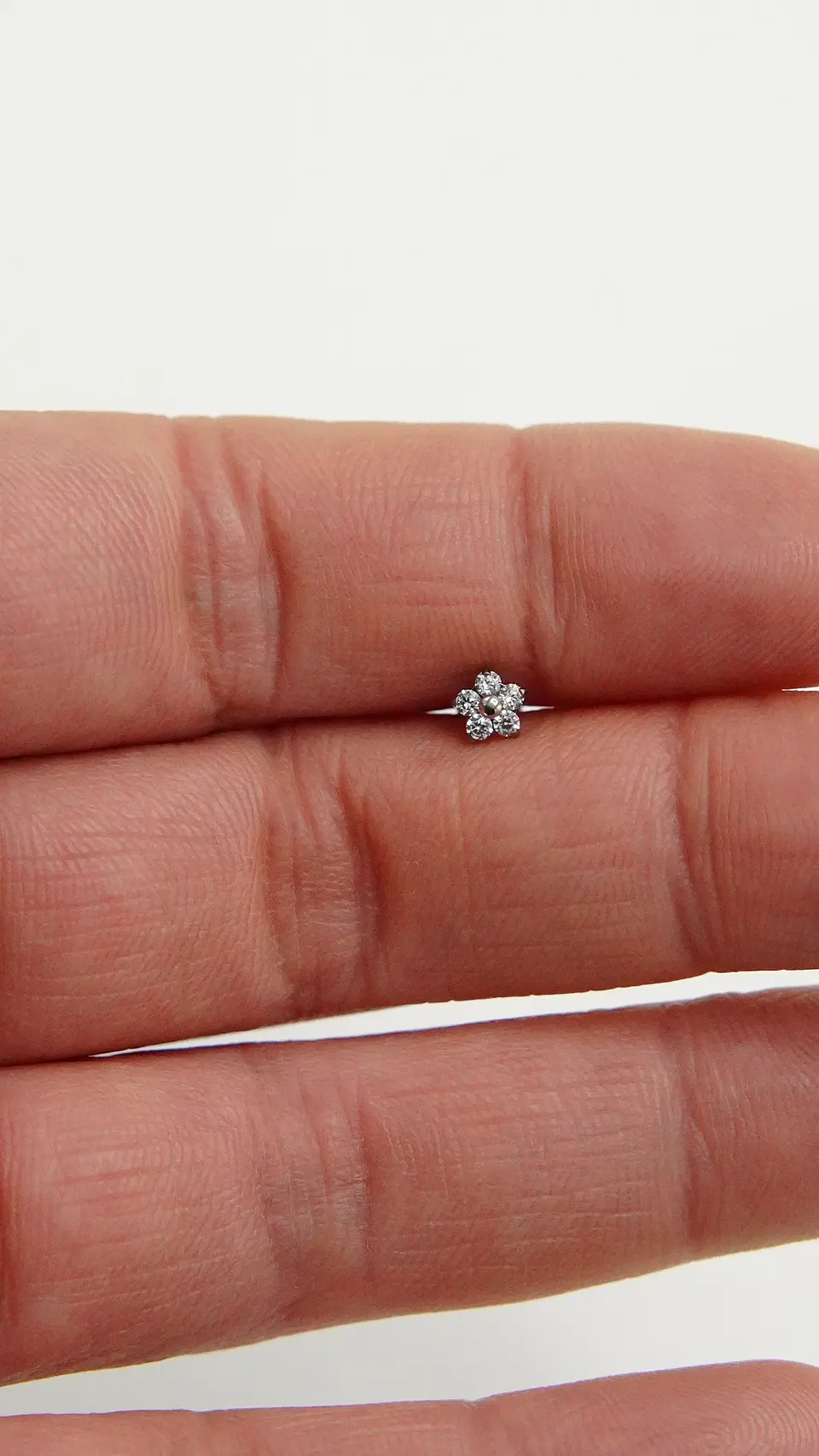 Aros flor titanio zirconia ASTM F136 plateados 9