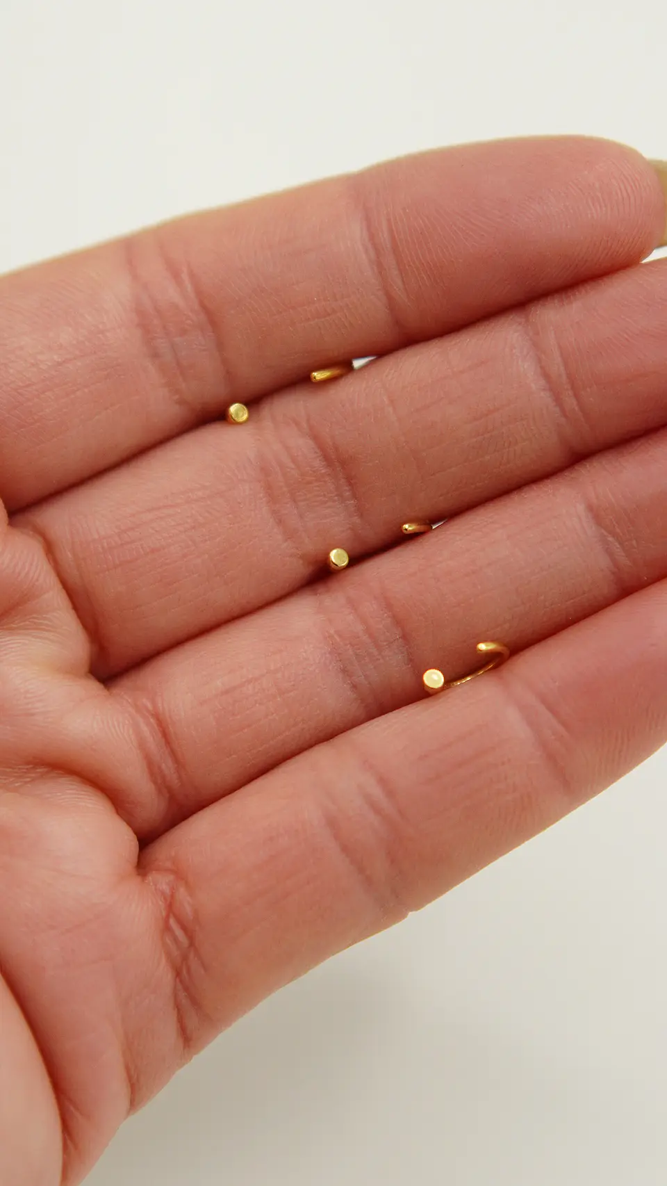 Pack de tres aros piercing abierto nostril titanio ASTM F136 dorados 6