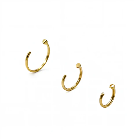 Pack de tres aros piercing abierto nostril titanio ASTM F136 dorados
