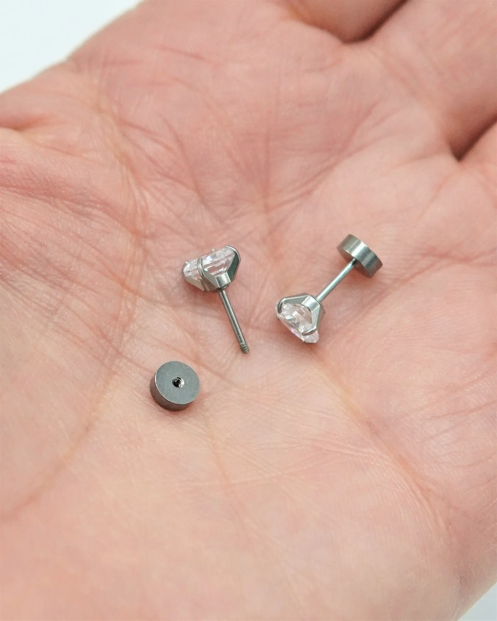 Aros punto de luz 6mm titanio tapa seguridad 20g 9