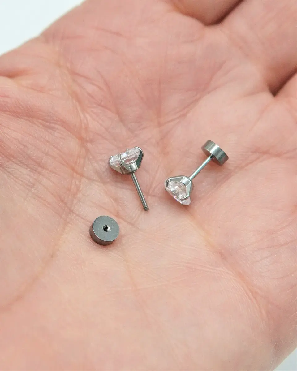 Aros punto de luz 6mm titanio tapa seguridad 20g 9