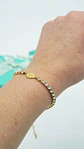 Pulsera San benito ajustable con zirconias chapada en oro 18k - Miniatura 3