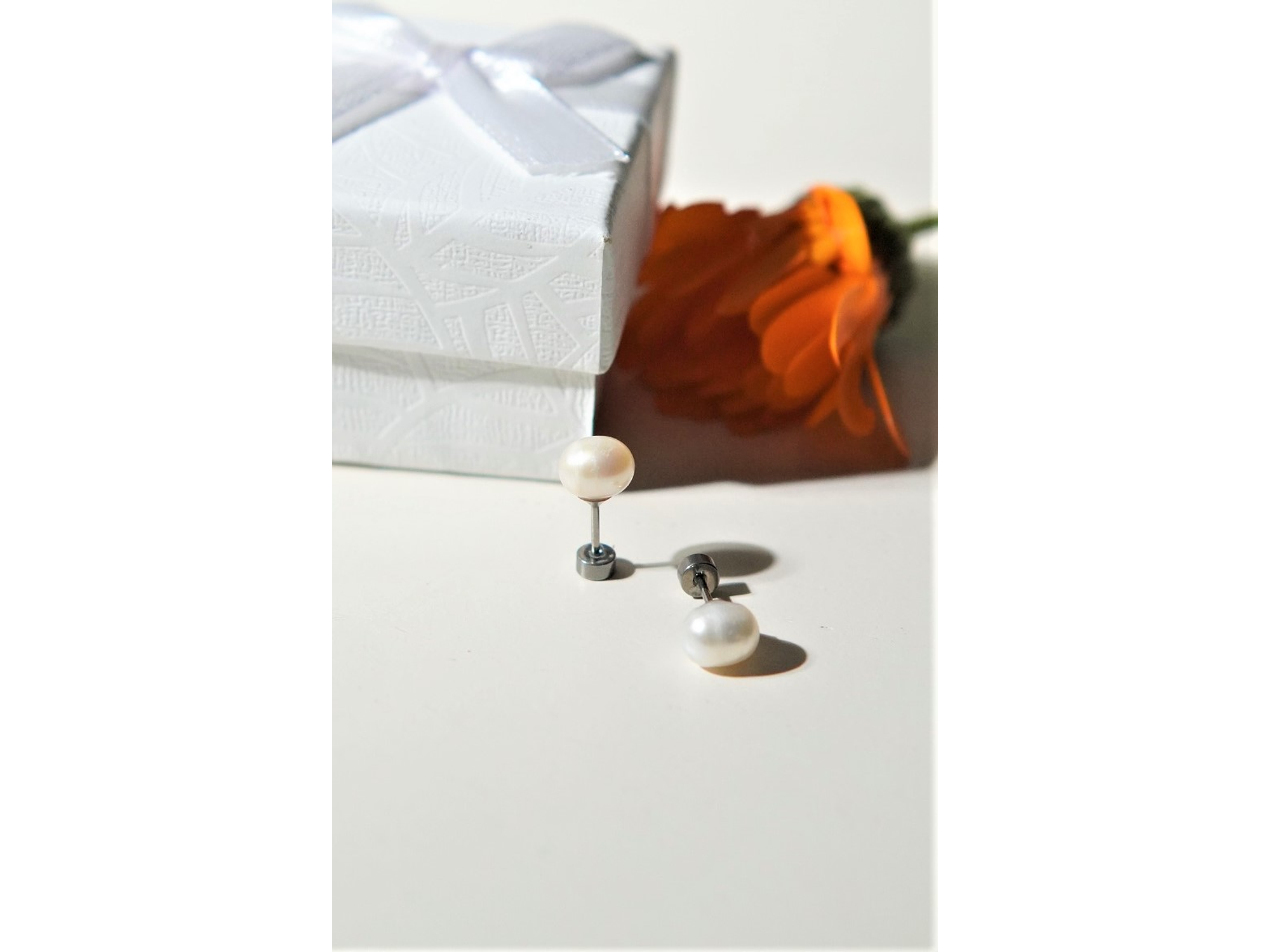 Aros Muriel perlas de rio 7mm titanio ASTM F136 Riviere 5