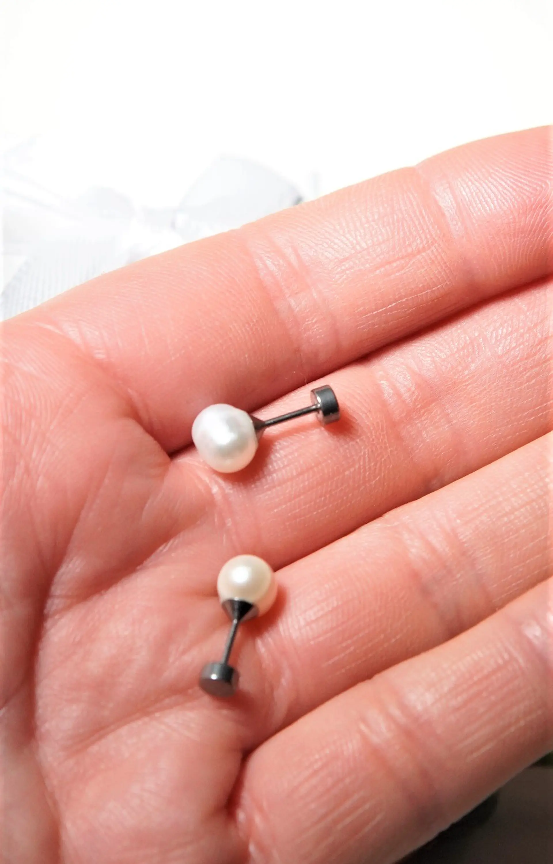 Aros Muriel perlas de rio 7mm titanio ASTM F136 Riviere 9