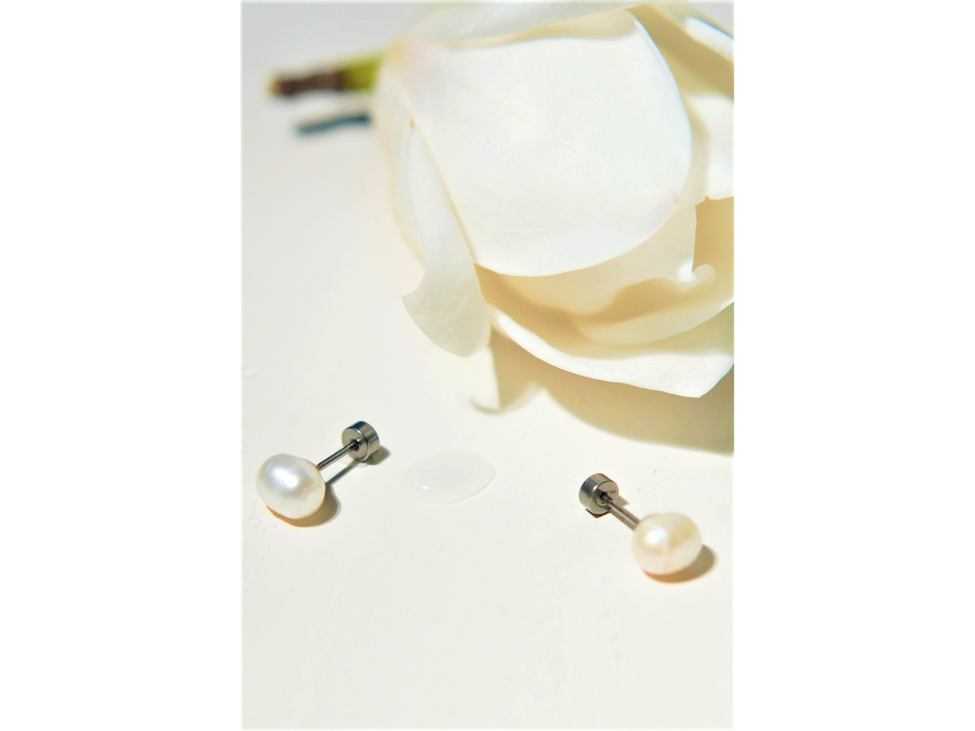 Aros Muriel perlas de rio 7mm titanio ASTM F136 Riviere 2