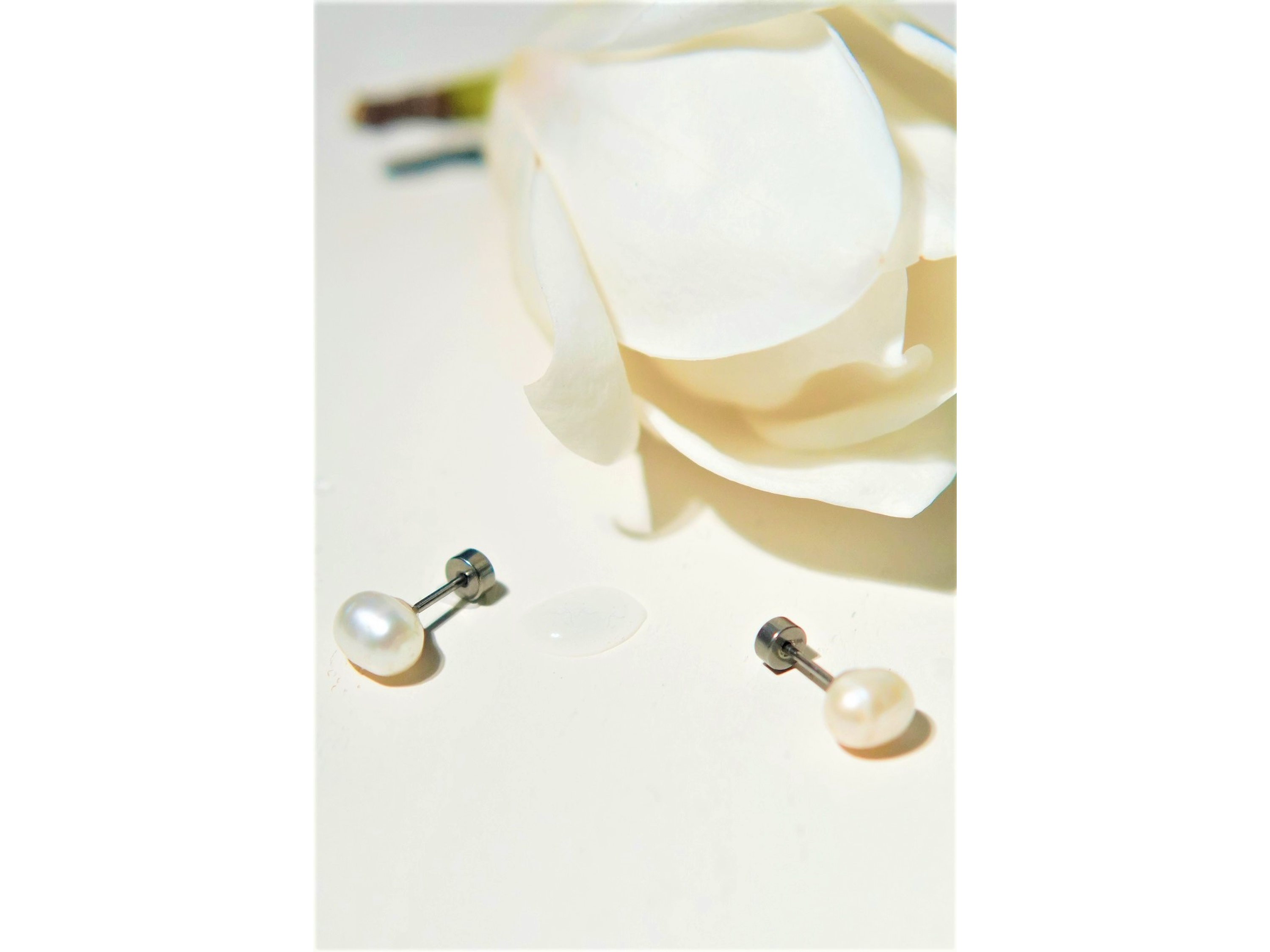 Aros Muriel perlas de rio 7mm titanio ASTM F136 Riviere 2