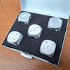 Pack de dados plateados en su caja original / Nuevos