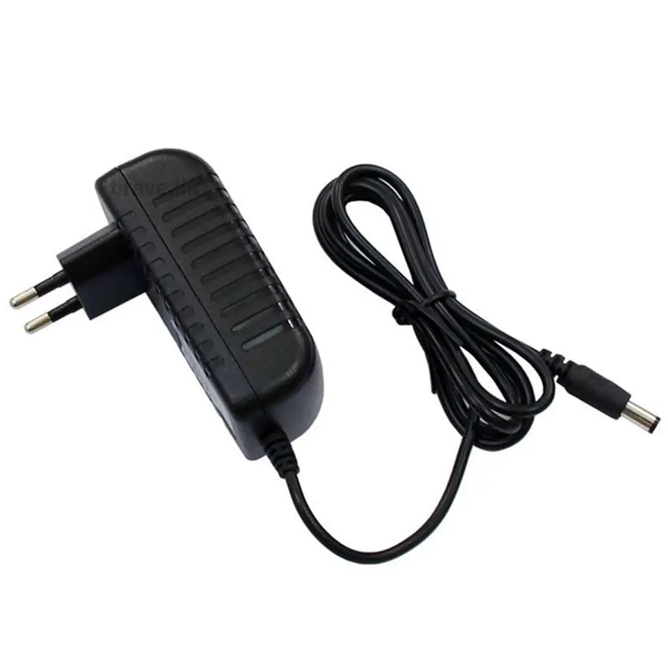 Transformador 12V 2A con enchufe adaptador. 1