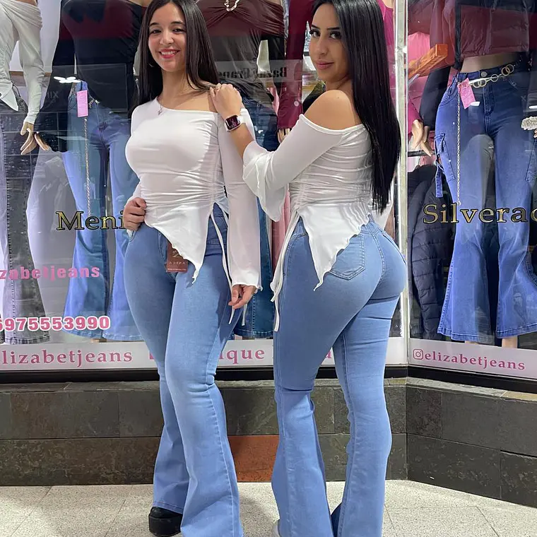 flare jeans patita ancha celeste tiro alto dos botones 1
